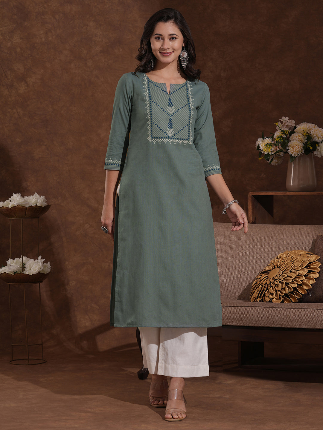 Straight fit kurta with block printed striped yoke and block printed striped cuff.