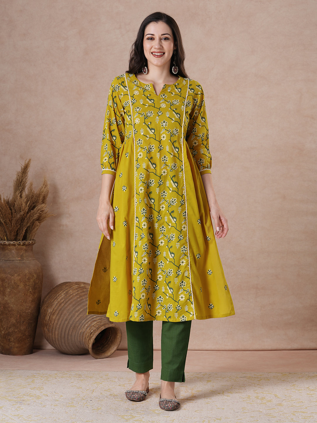 Printed A-Line Princess Kurta with Mirror Work on Neckline.