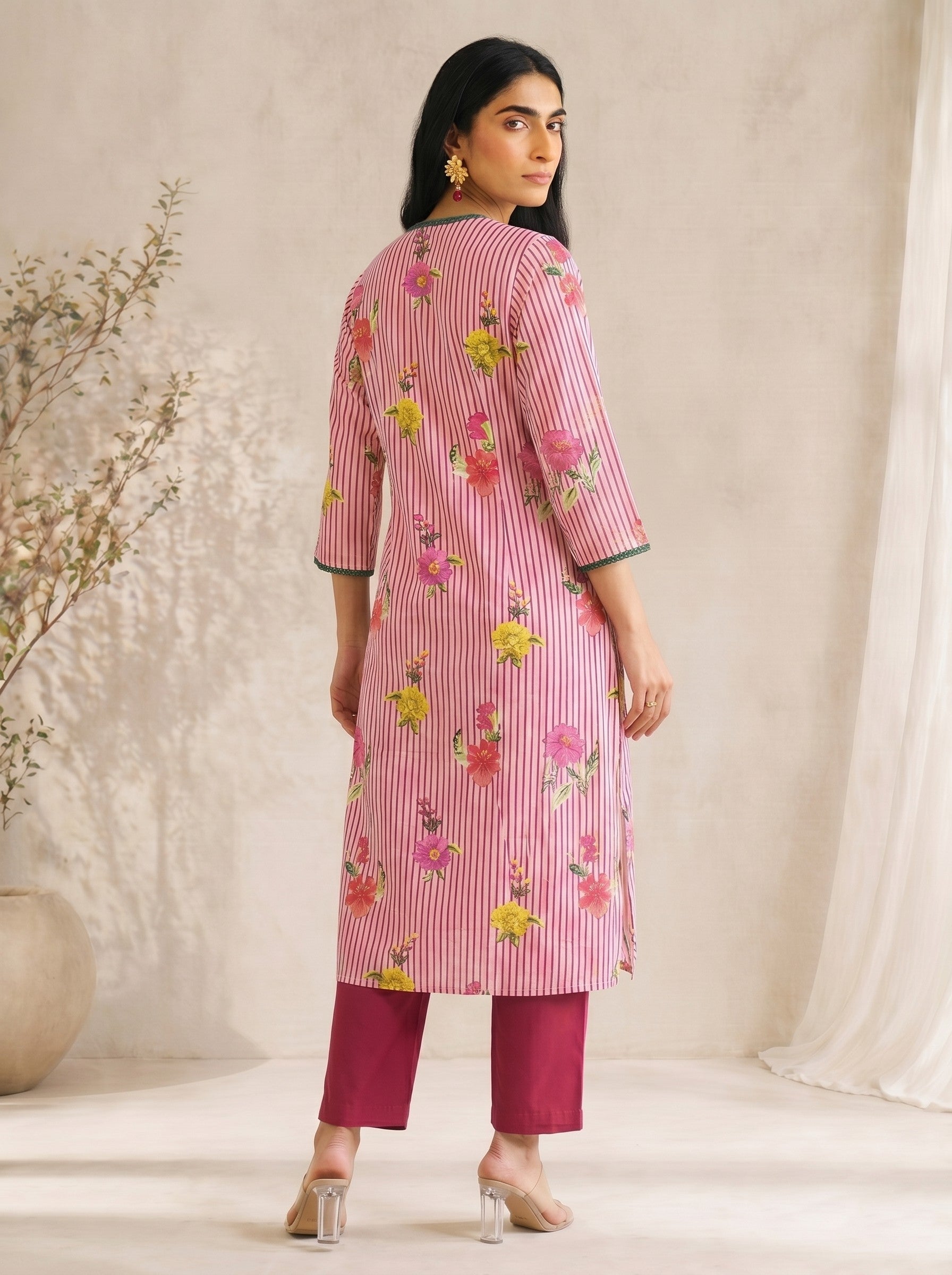 JOYLAND-Printed A-line Cambric kurta with center box pleat, bell sleeves and piping on neck and sleeves with beads.