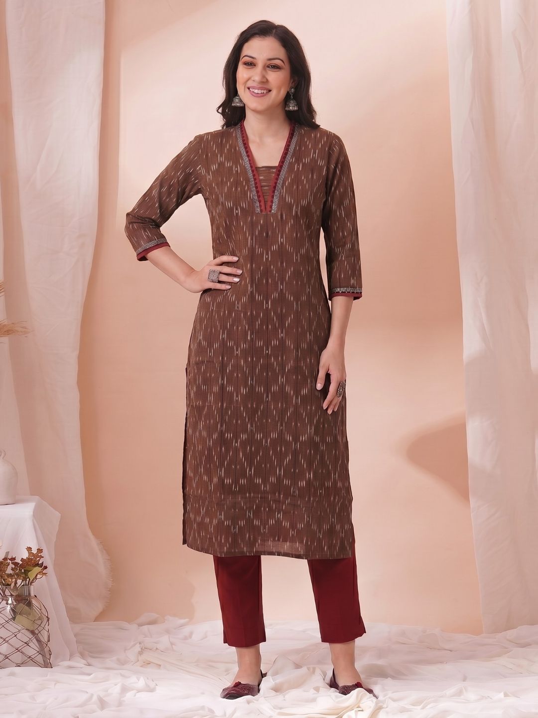 Straight Fit Ikat Kurta with Featuring Woven Stripes, Handwork & Solid Trim.