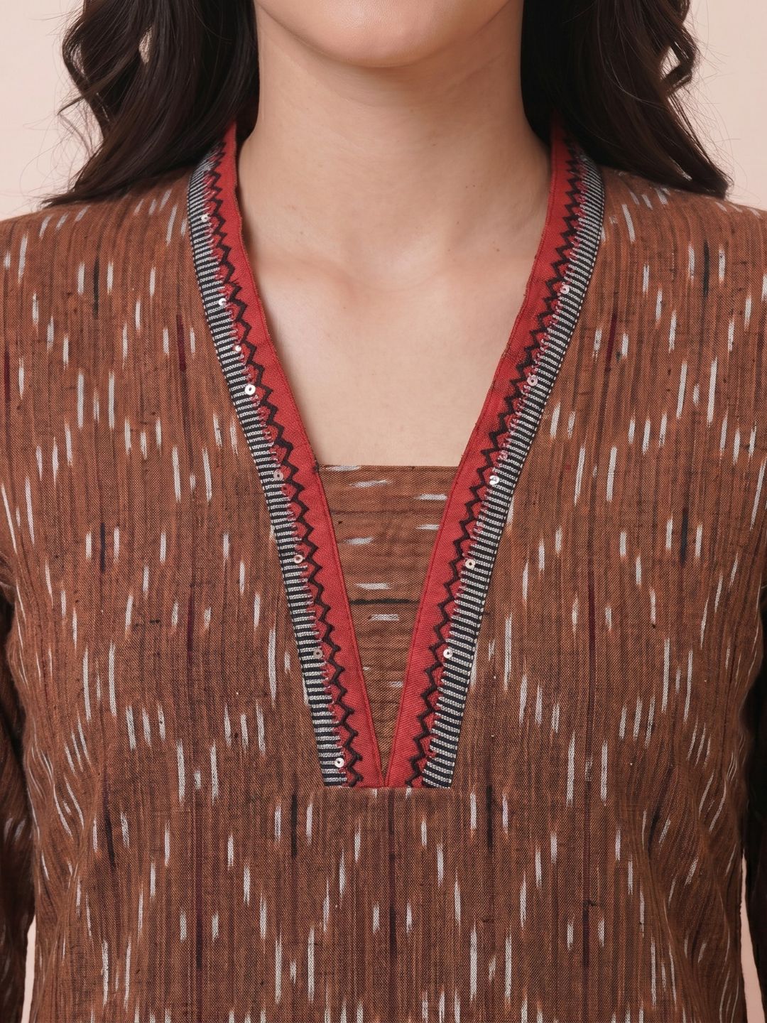 Straight Fit Ikat Kurta with Featuring Woven Stripes, Handwork & Solid Trim.