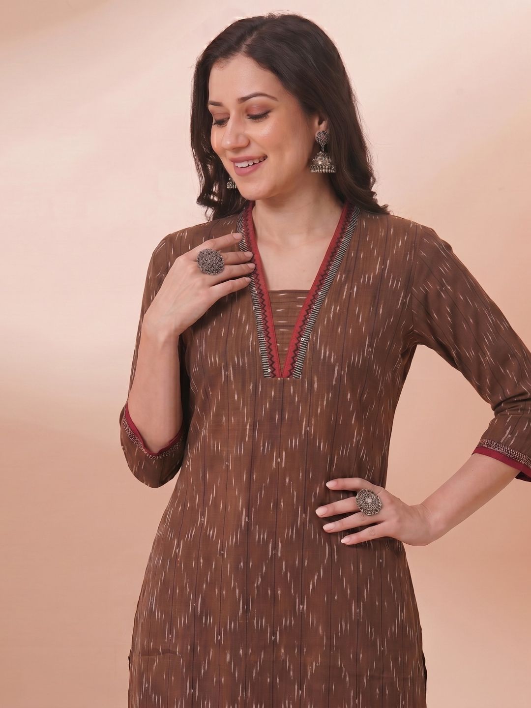 Straight Fit Ikat Kurta with Featuring Woven Stripes, Handwork & Solid Trim.