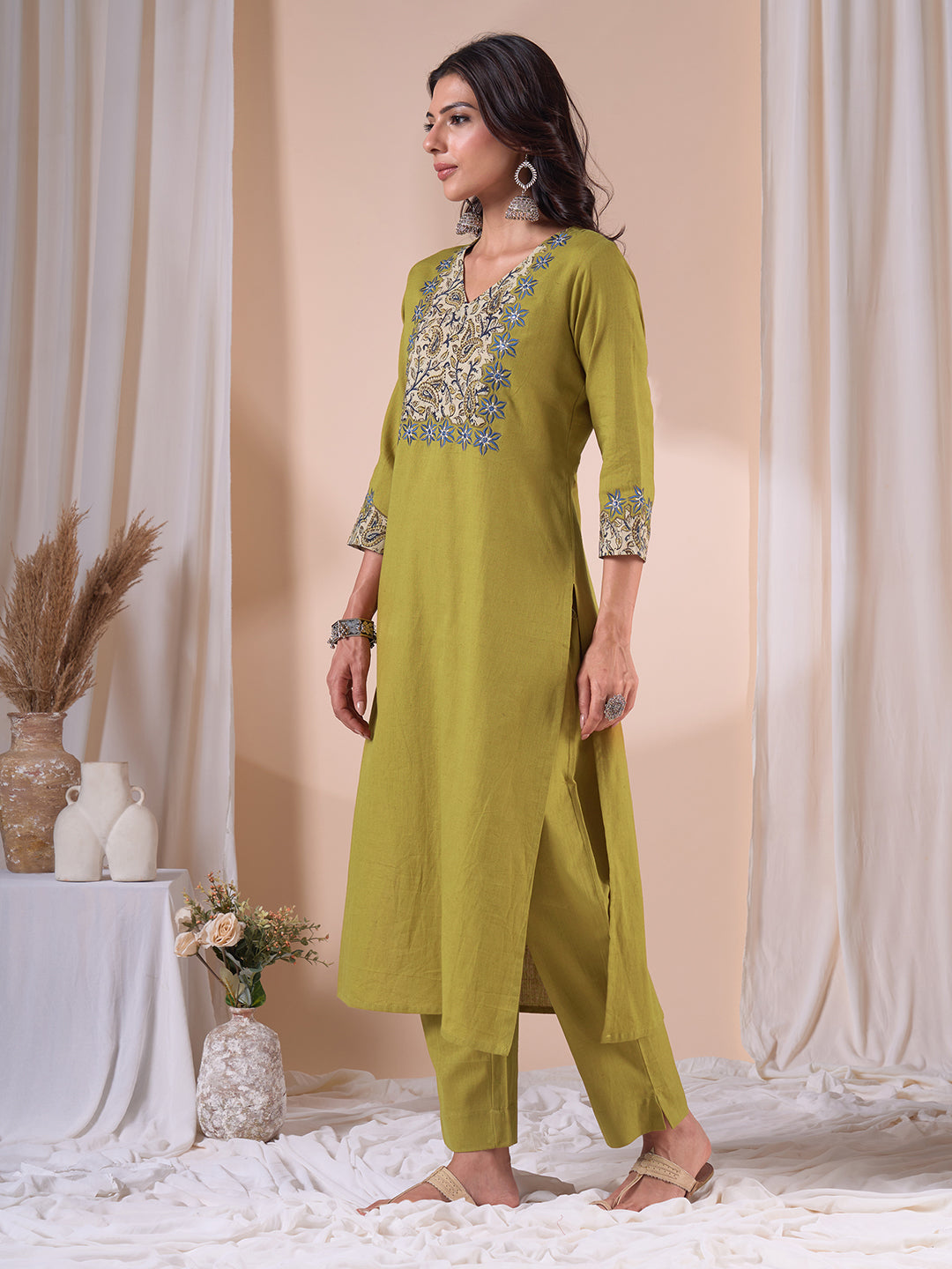 Straight Fit Cotton Kurta with Kalamkari Cutwork Yoke, Floral Embroidery and Sleeves.