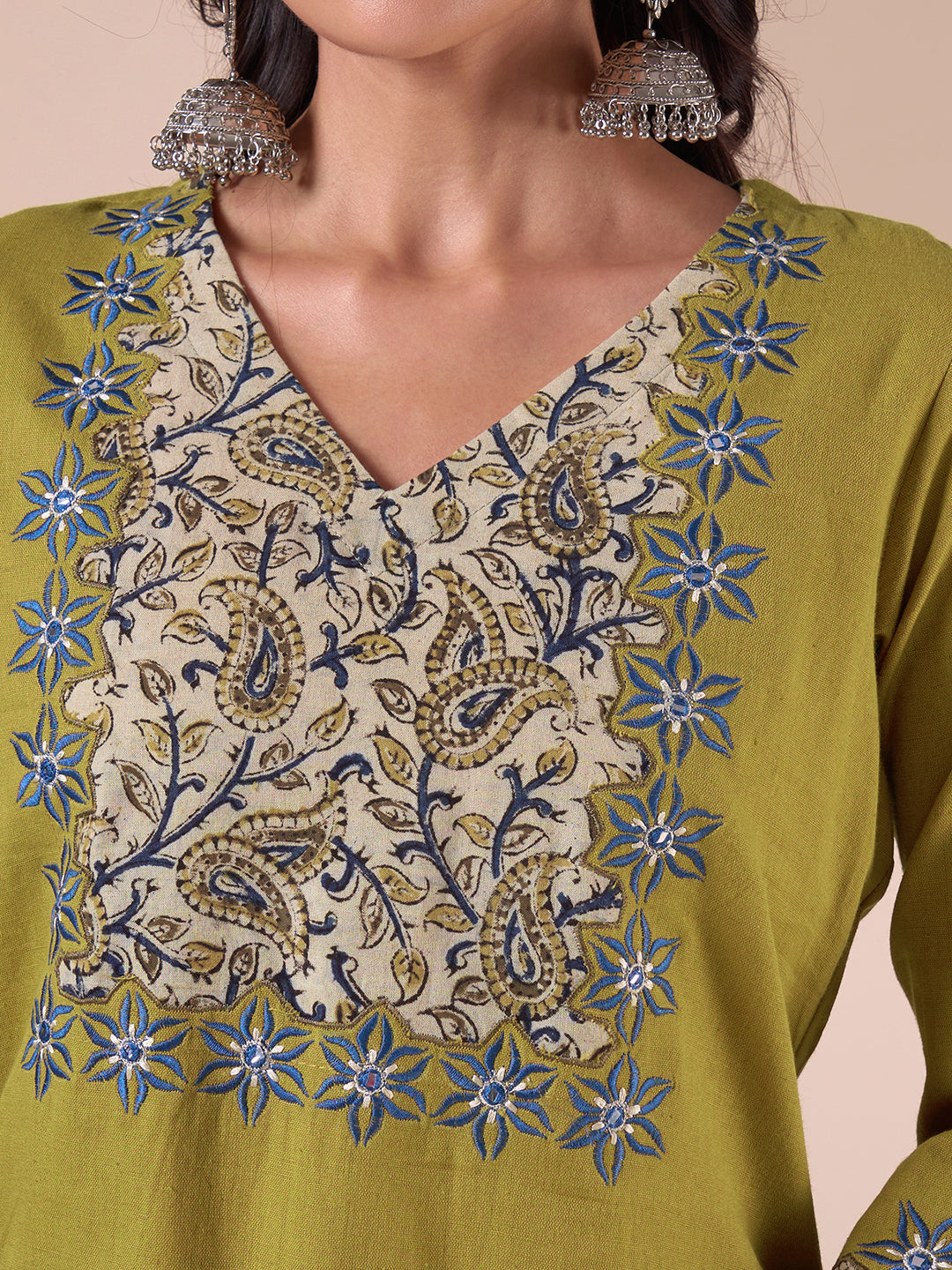 Straight Fit Cotton Kurta with Kalamkari Cutwork Yoke, Floral Embroidery and Sleeves.