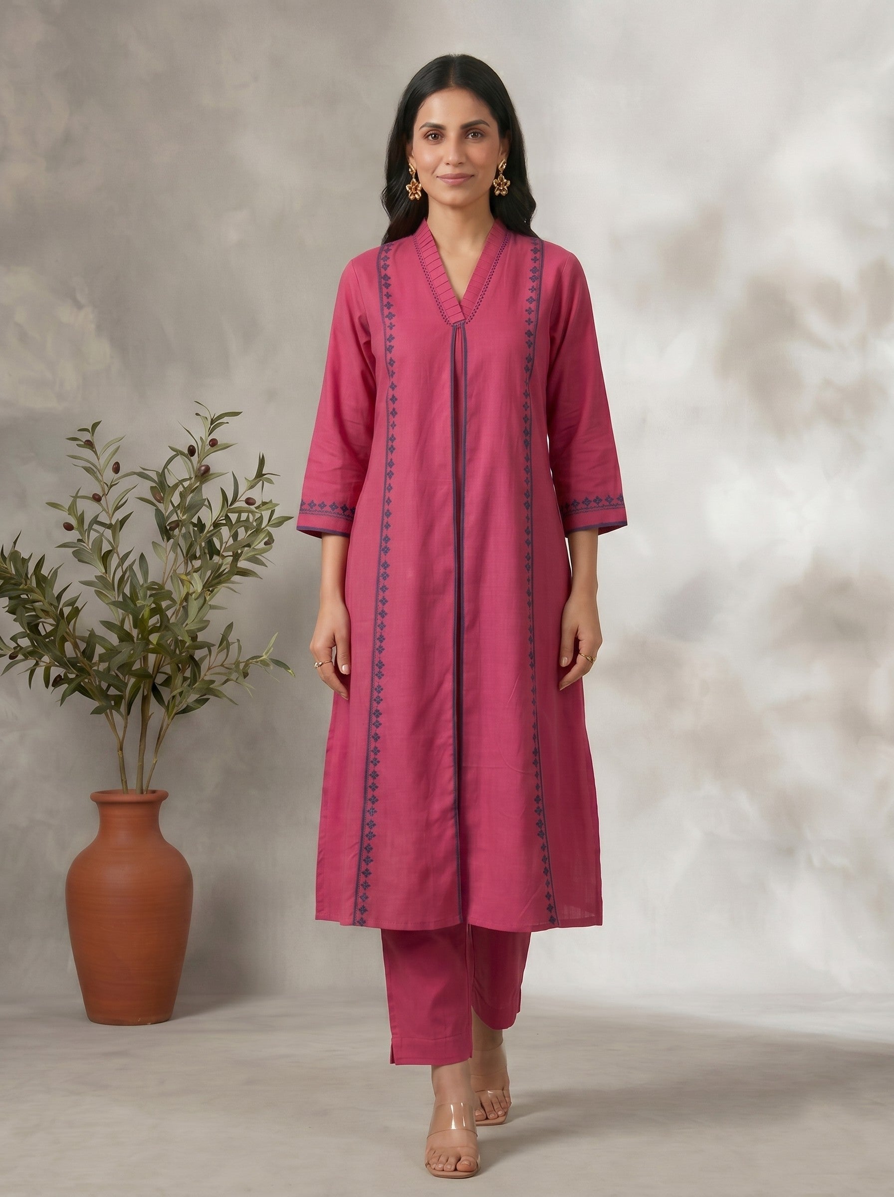 Solid Pink Embroidered V-Neck Kurta Set with Matching Straight Pants and Elegant Detailing.