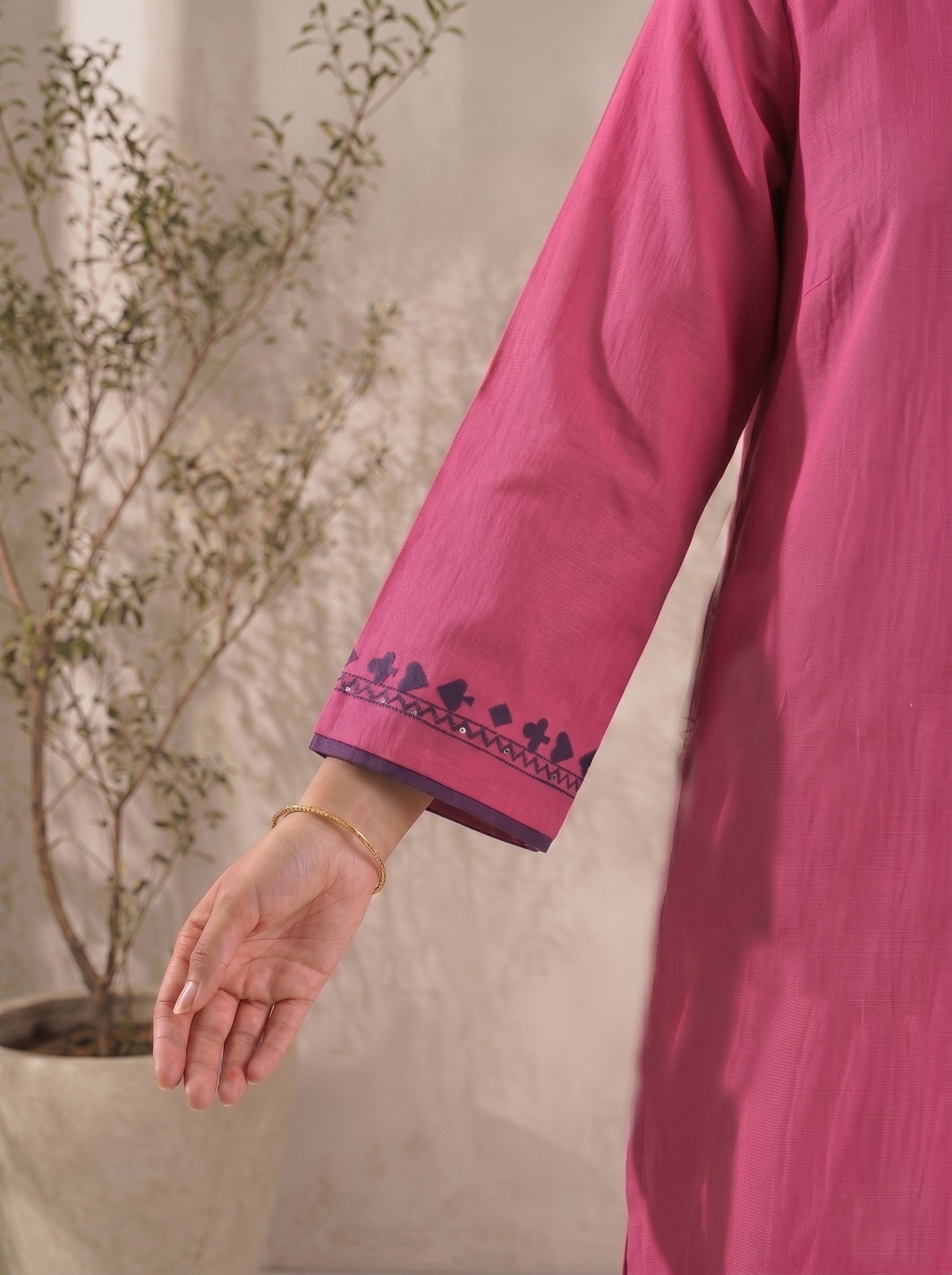 Solid Pink Embroidered V-Neck Kurta Set with Matching Straight Pants and Elegant Detailing.