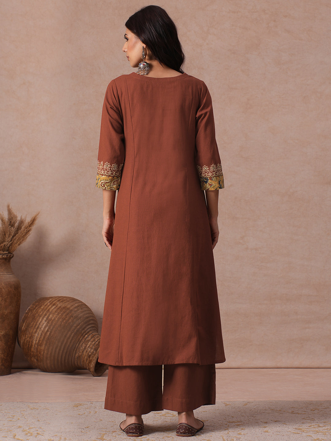 A-Line Cotton Kurta Set with Kalamkari Cutwork Yoke, Cuffs and Cordwork Detail & Solid Palazoo.
