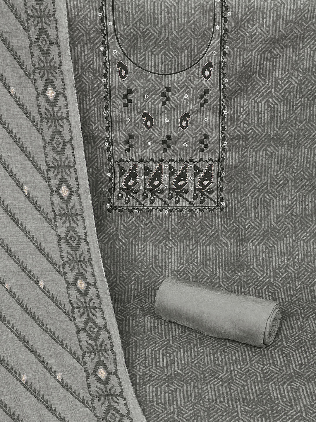 Elegant unstitched dress material in premium Chanderi fabric with ethnic motifs and handwork accents.