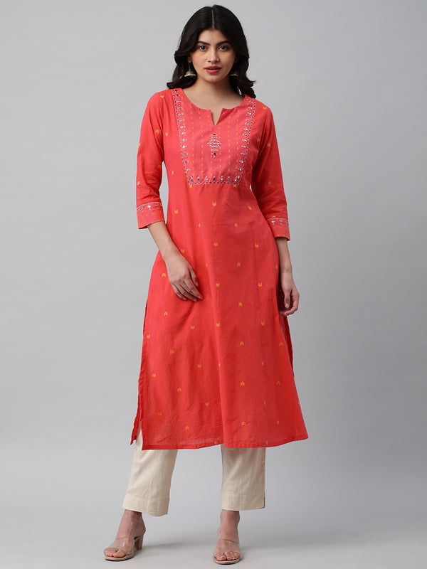 A line cotton weave kurta with delicate mirror work.