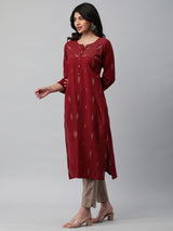 Straight cotton kurta with metal buttons and couching line details.