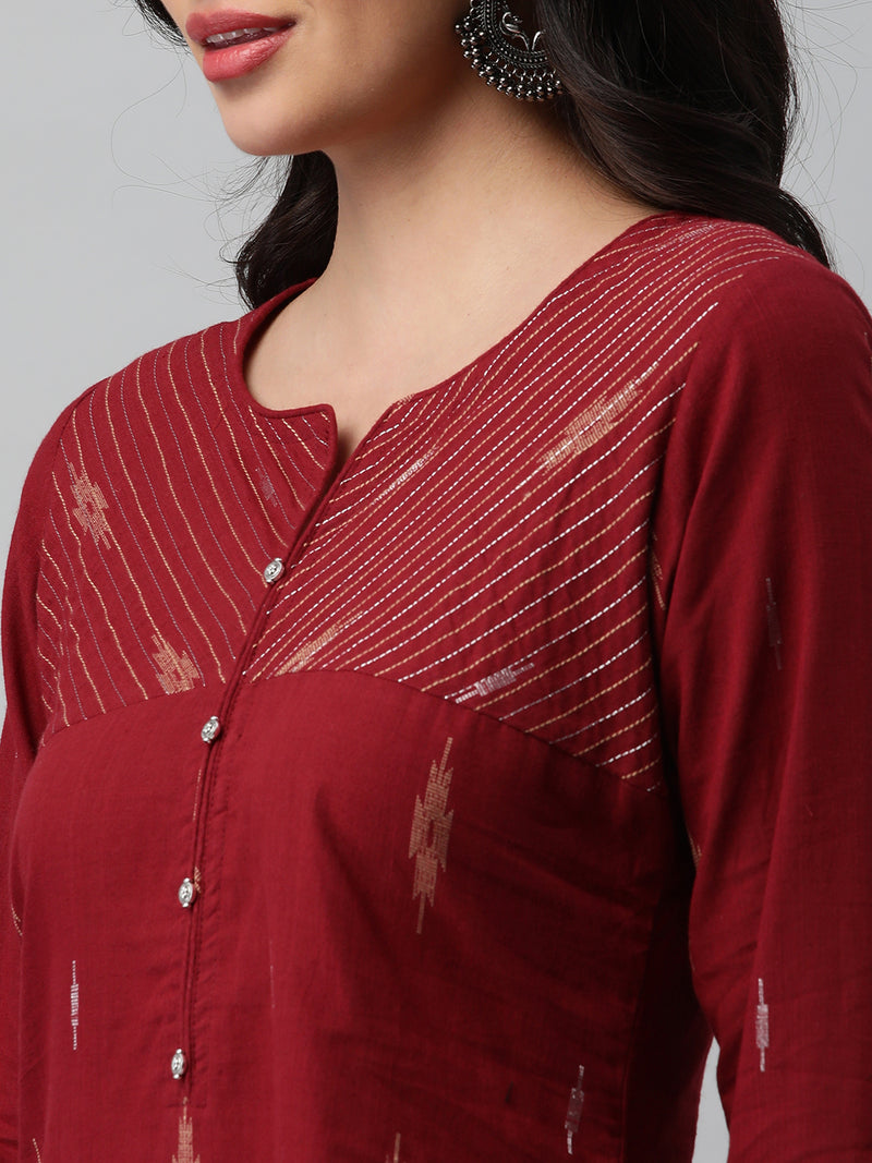 Straight cotton kurta with metal buttons and couching line details.