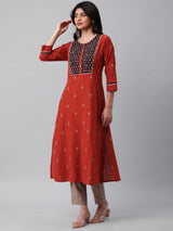 Leher - A line dobby kurta with a printed yoke highlighted with embroidery.