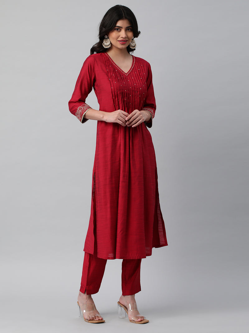 INAARA - Flared Pleated silk blend kurta with zari embroidery and sequin work.