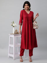 INAARA - Flared Pleated silk blend kurta with zari embroidery and sequin work.