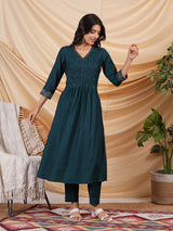 INAARA - Flared Pleated silk blend kurta with zari embroidery and sequin work.