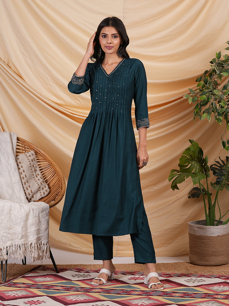 INAARA - Flared Pleated silk blend kurta with zari embroidery and sequin work.