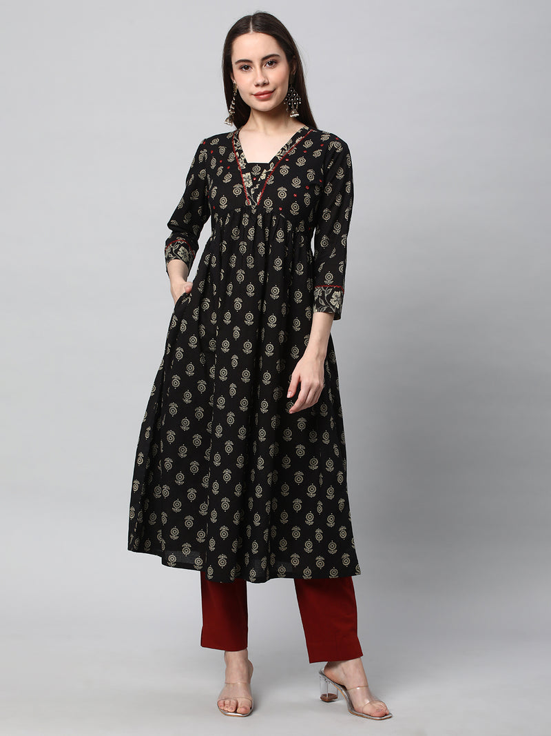 Printed cotton kurta with gathering and hand embroidery.