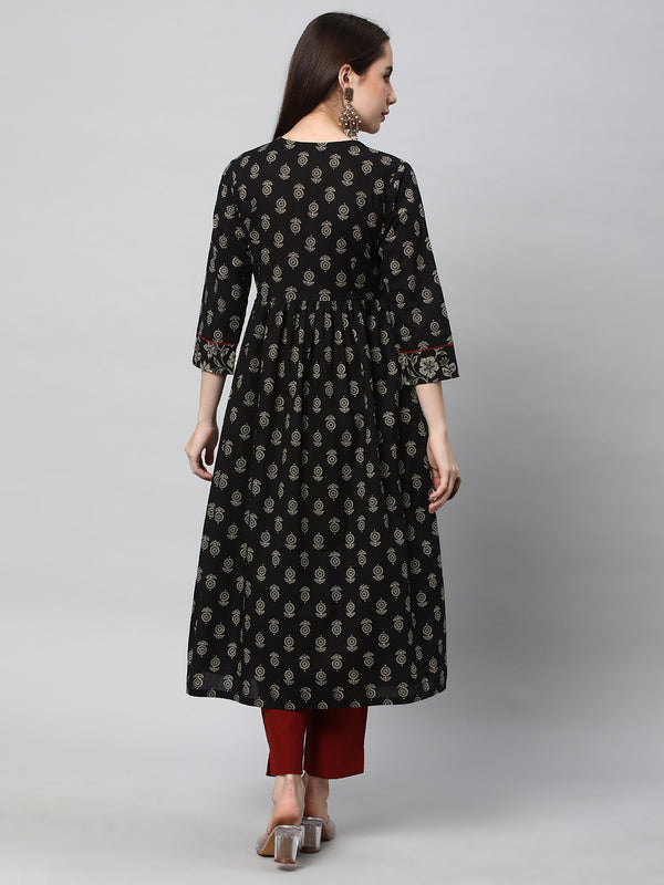 Printed cotton kurta with gathering and hand embroidery.