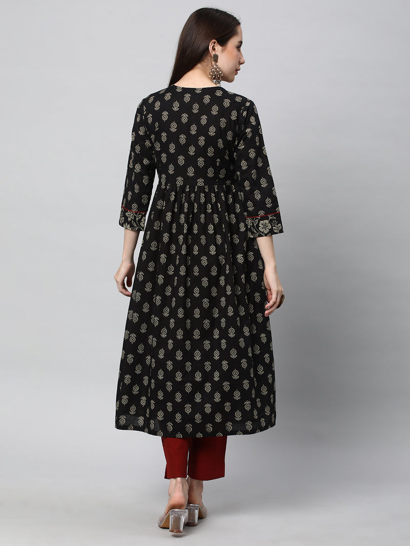 Printed cotton kurta with gathering and hand embroidery.