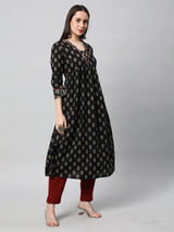 Printed cotton kurta with gathering and hand embroidery.