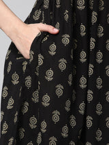 Printed cotton kurta with gathering and hand embroidery.