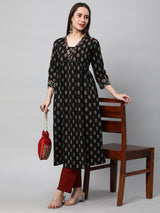 Printed cotton kurta with gathering and hand embroidery.