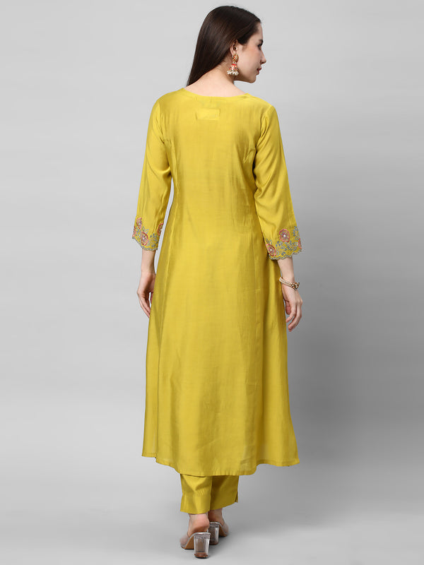 A line kurta in silk blend fabric with embroidered placket and sleeve.
