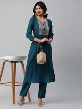 INAARA - A line kurta in silk blend fabric with zari and sequin detailing.