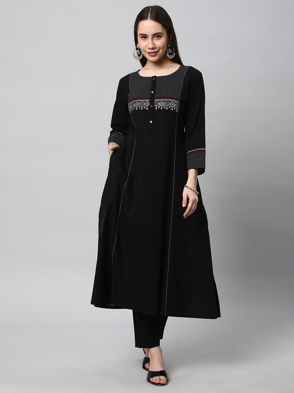 Leher - A line black kurta with textured fabric and block print detailing.