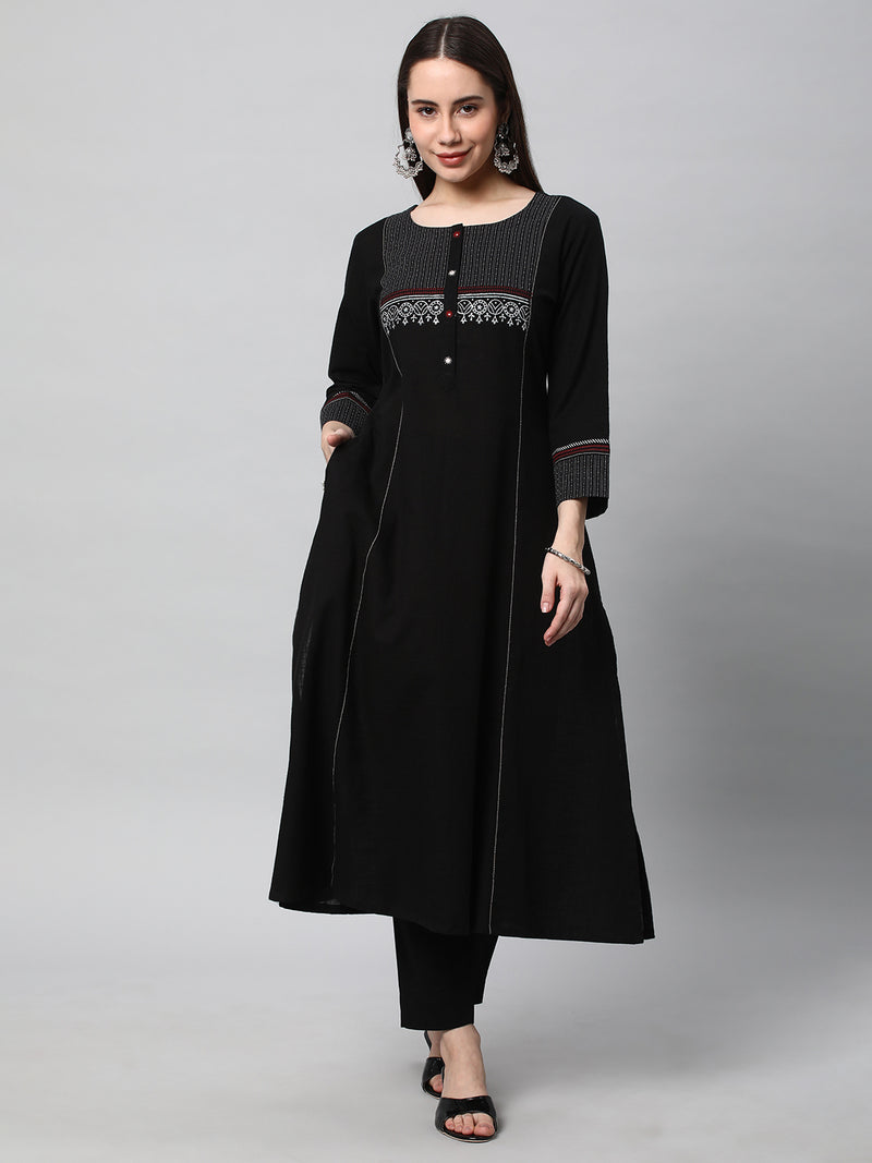 Leher - A line black kurta with textured fabric and block print detailing.