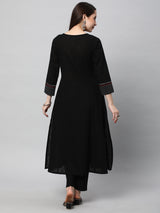 Leher - A line black kurta with textured fabric and block print detailing.