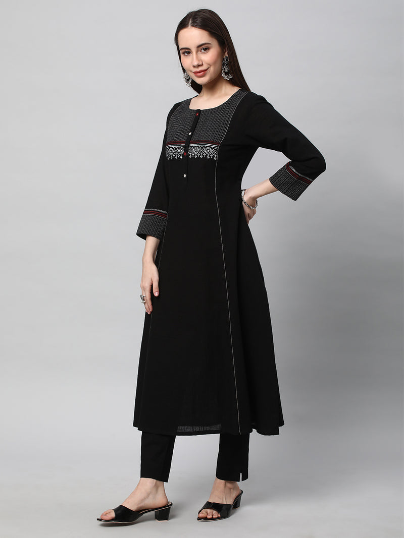 Leher - A line black kurta with textured fabric and block print detailing.