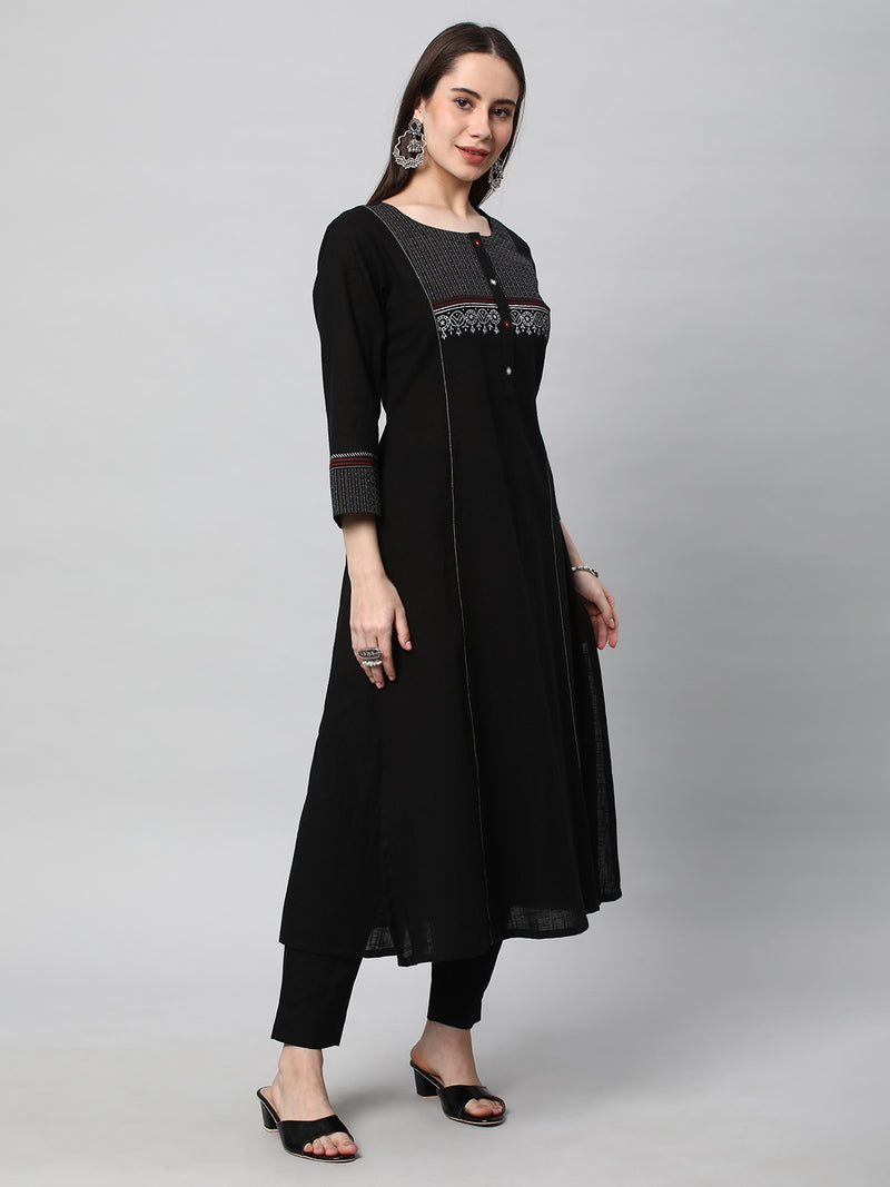 Leher - A line black kurta with textured fabric and block print detailing.