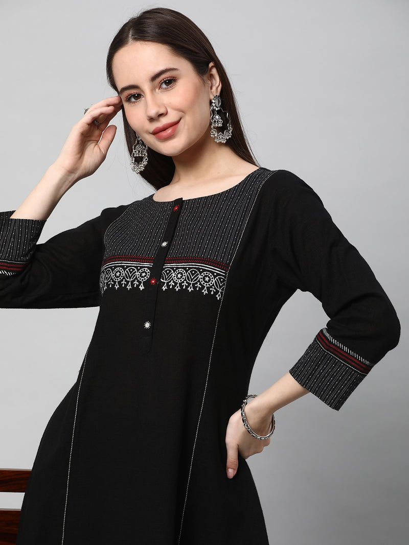 Leher - A line black kurta with textured fabric and block print detailing.