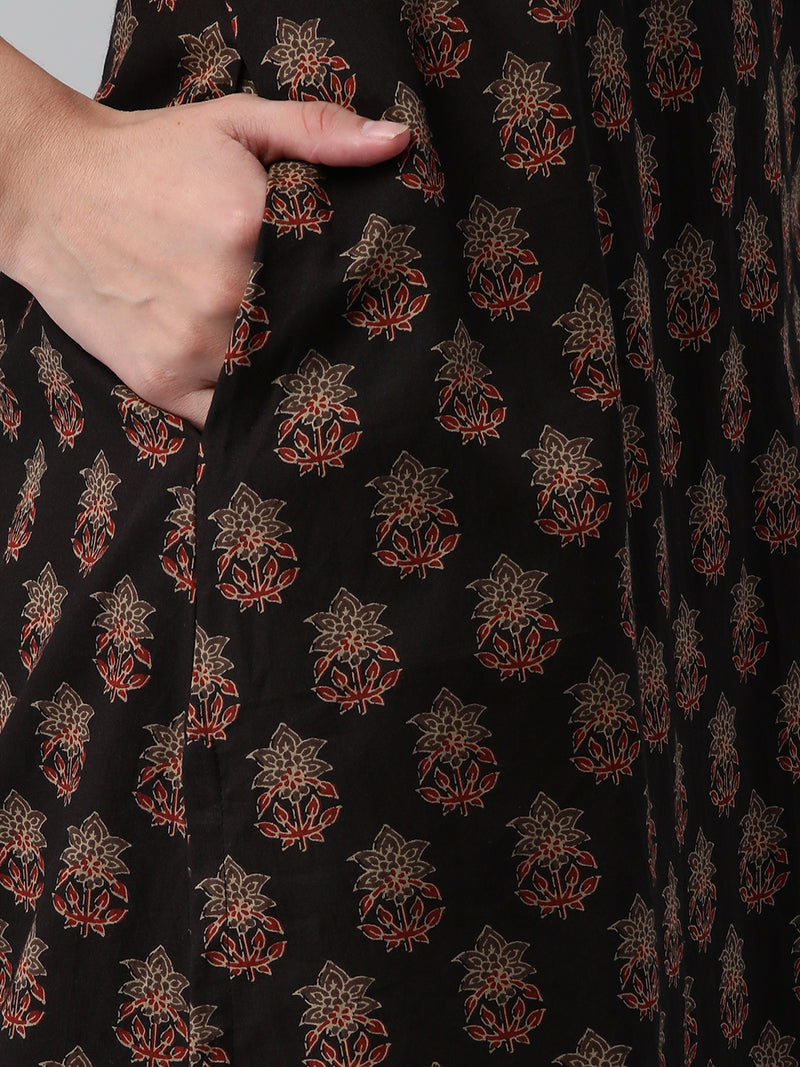 Printed cotton kurta with gathering and hand embroidery detailing.