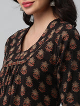 Printed cotton kurta with gathering and hand embroidery detailing.