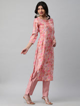 A printed chanderi kurta with embellishment at neck and sleeves.