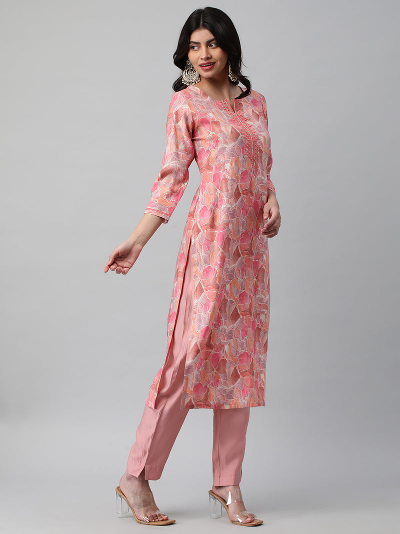 A printed chanderi kurta with embellishment at neck and sleeves.