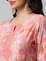 A printed chanderi kurta with embellishment at neck and sleeves.