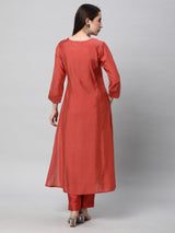 VAMA - A flared kurta with shoulder placement with  machine embroidery enhanced with sequin detail.