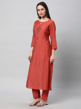 VAMA - A flared kurta with shoulder placement with  machine embroidery enhanced with sequin detail.