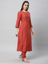 VAMA - A flared kurta with shoulder placement with  machine embroidery enhanced with sequin detail.