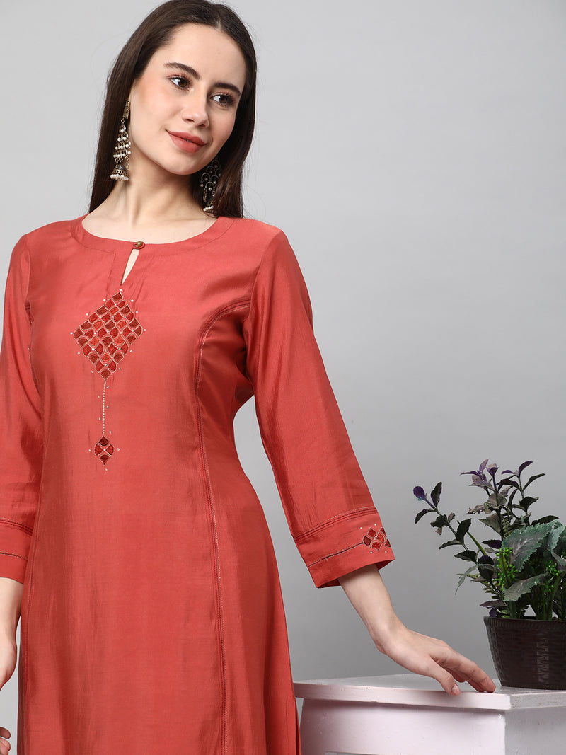 VAMA - A flared kurta with shoulder placement with  machine embroidery enhanced with sequin detail.