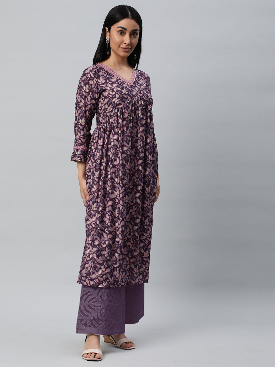 Party Edit- V-neck kurta with gathers at empire line along with the lace detail