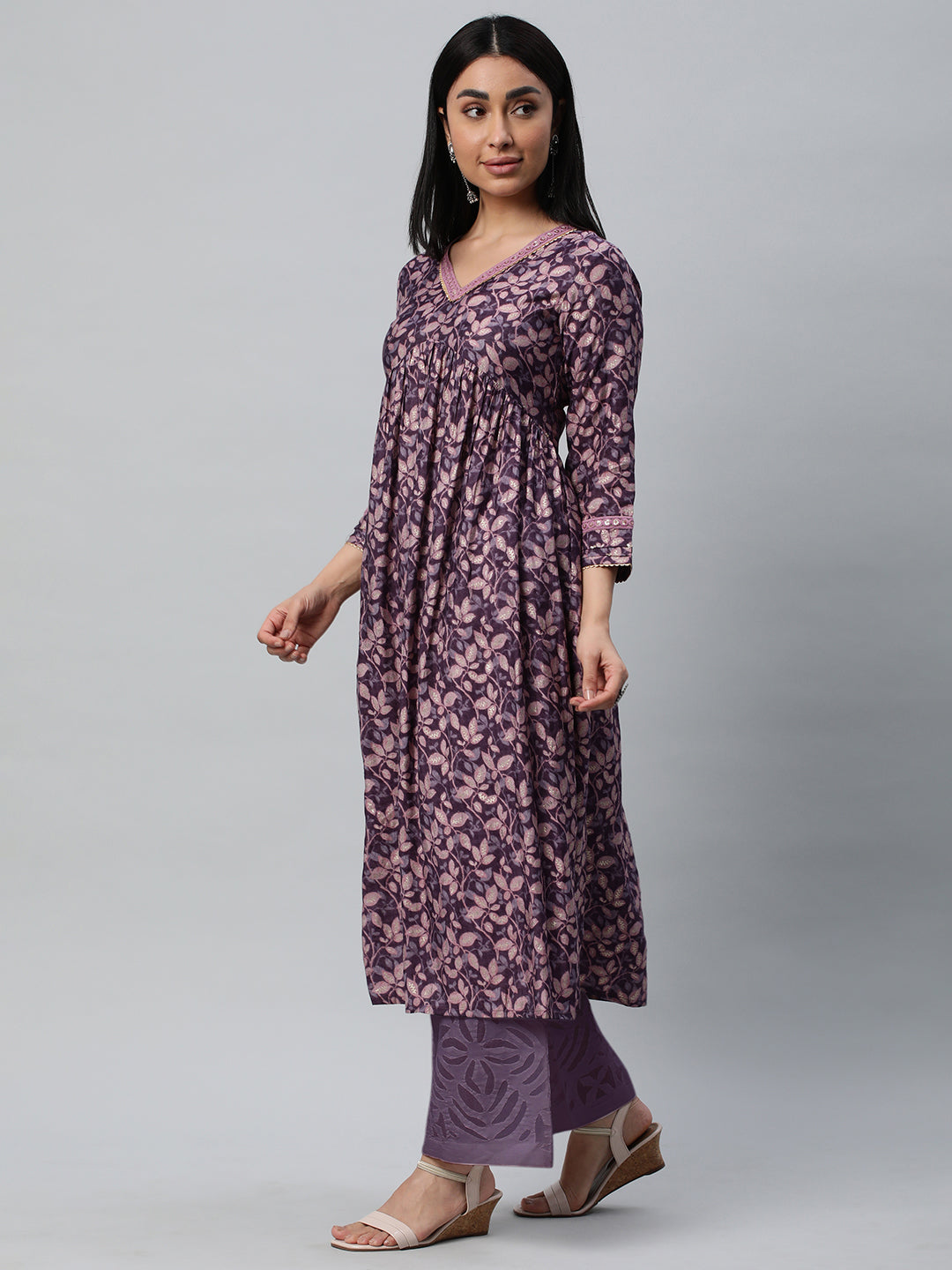 Party Edit- V-neck kurta with gathers at empire line along with the lace detail