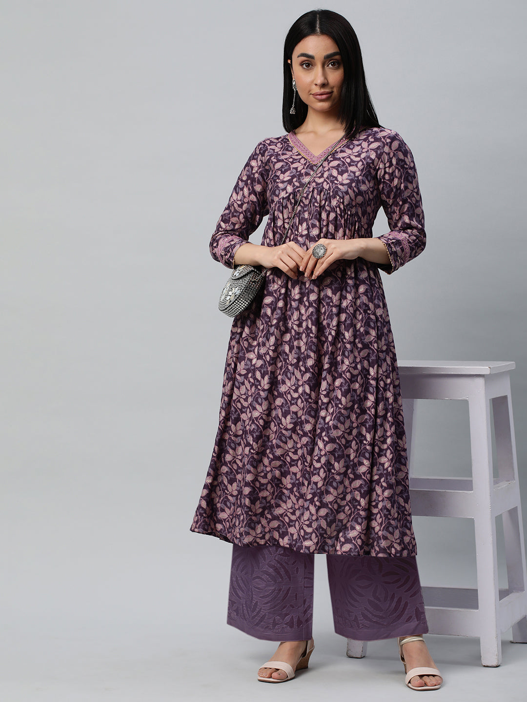 Party Edit- V-neck kurta with gathers at empire line along with the lace detail