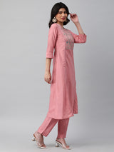 INAARA - A shoulder princess kurta with the detail of contrasting stitch lines.