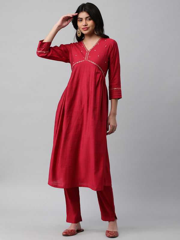 A Flared kurta with mock placket and machine embroidery.