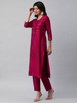 INAARA - A viscose two color fabric straight kurta with sequin embellishment.