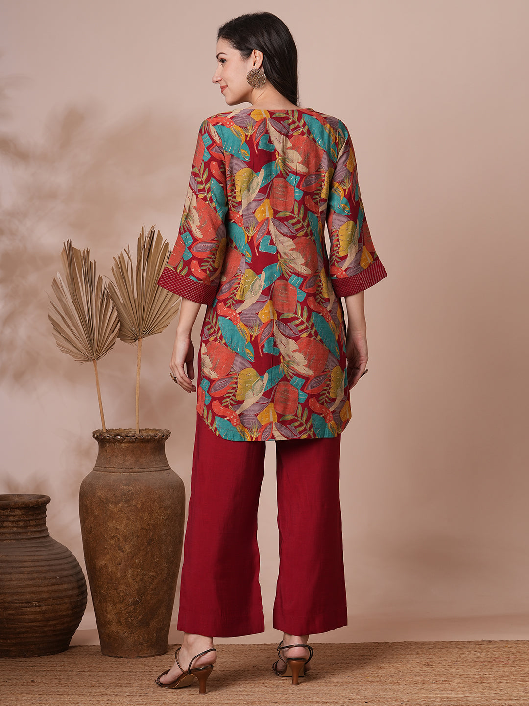 Party Edit- Printed centre pleated co-ord set with stitch lines on neck and cuff with tassel detailing, paired with palazzo